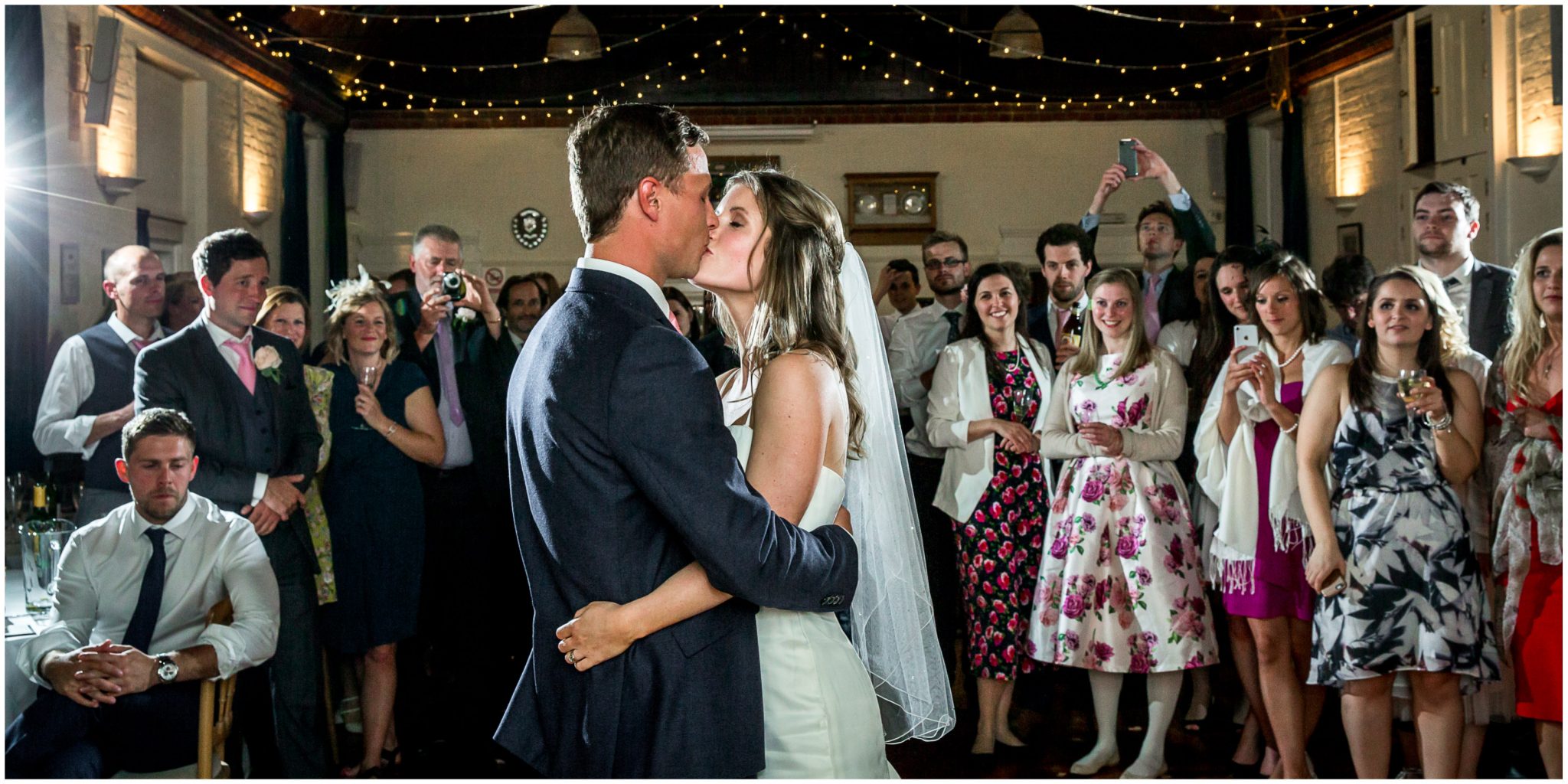 wedding couple kissing during first dance