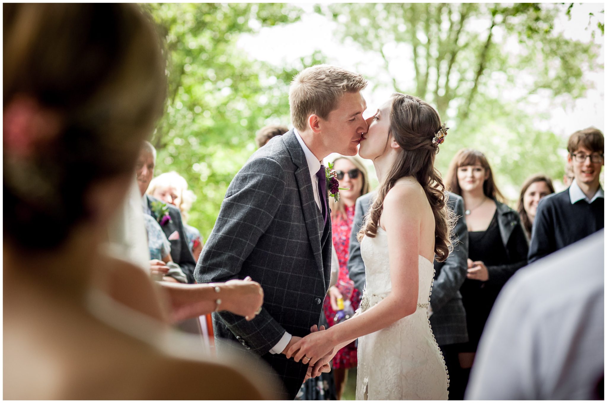 Timsbury Manor Festival Wedding bride and groom kiss