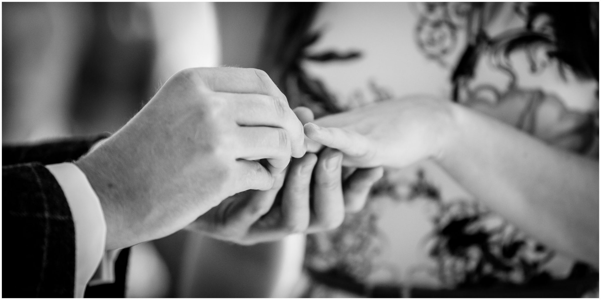 Portsmouth Registry Office wedding groom placing ring on bride's finger