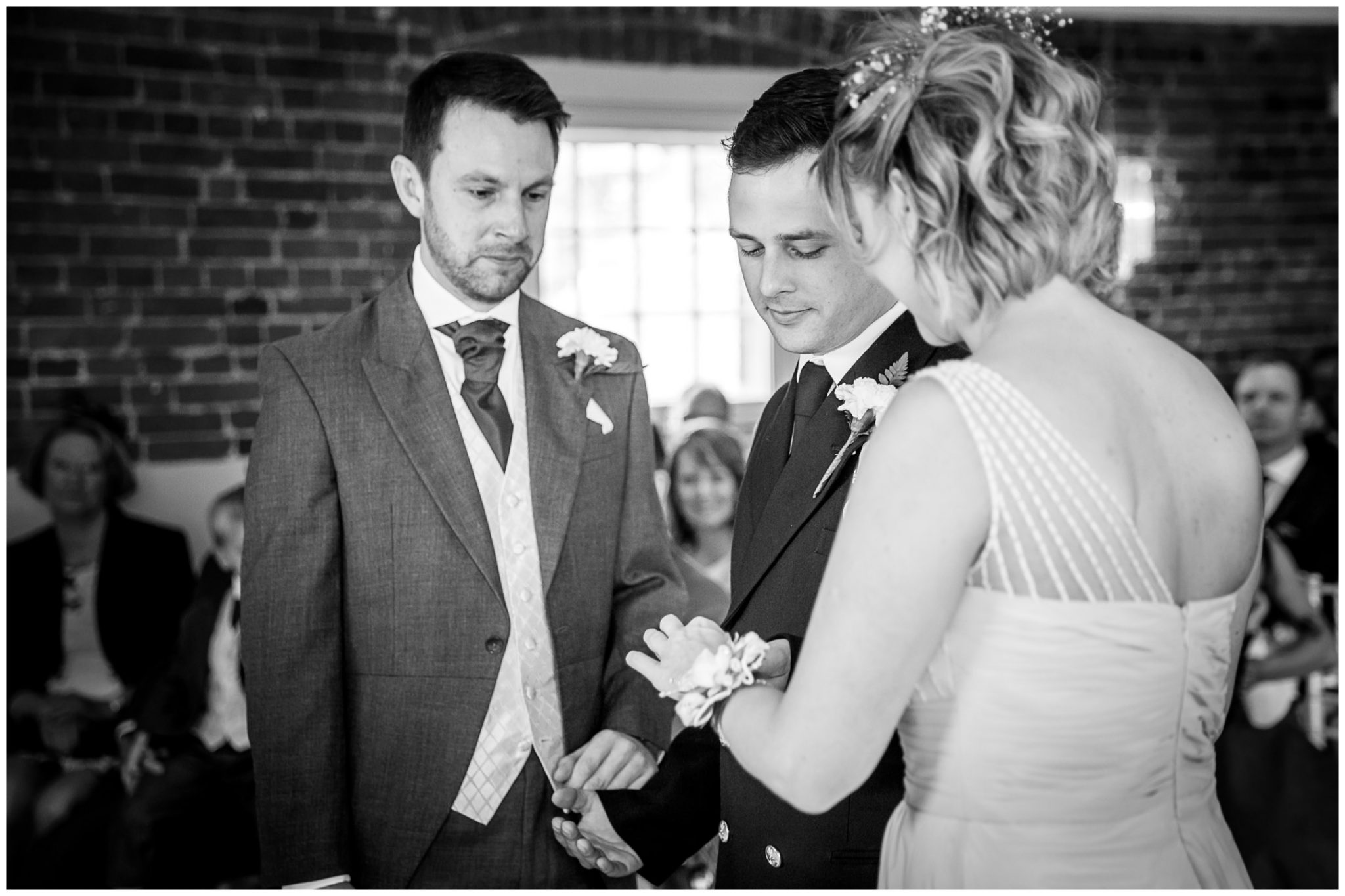 Sopley wedding photographer groom takes a ring