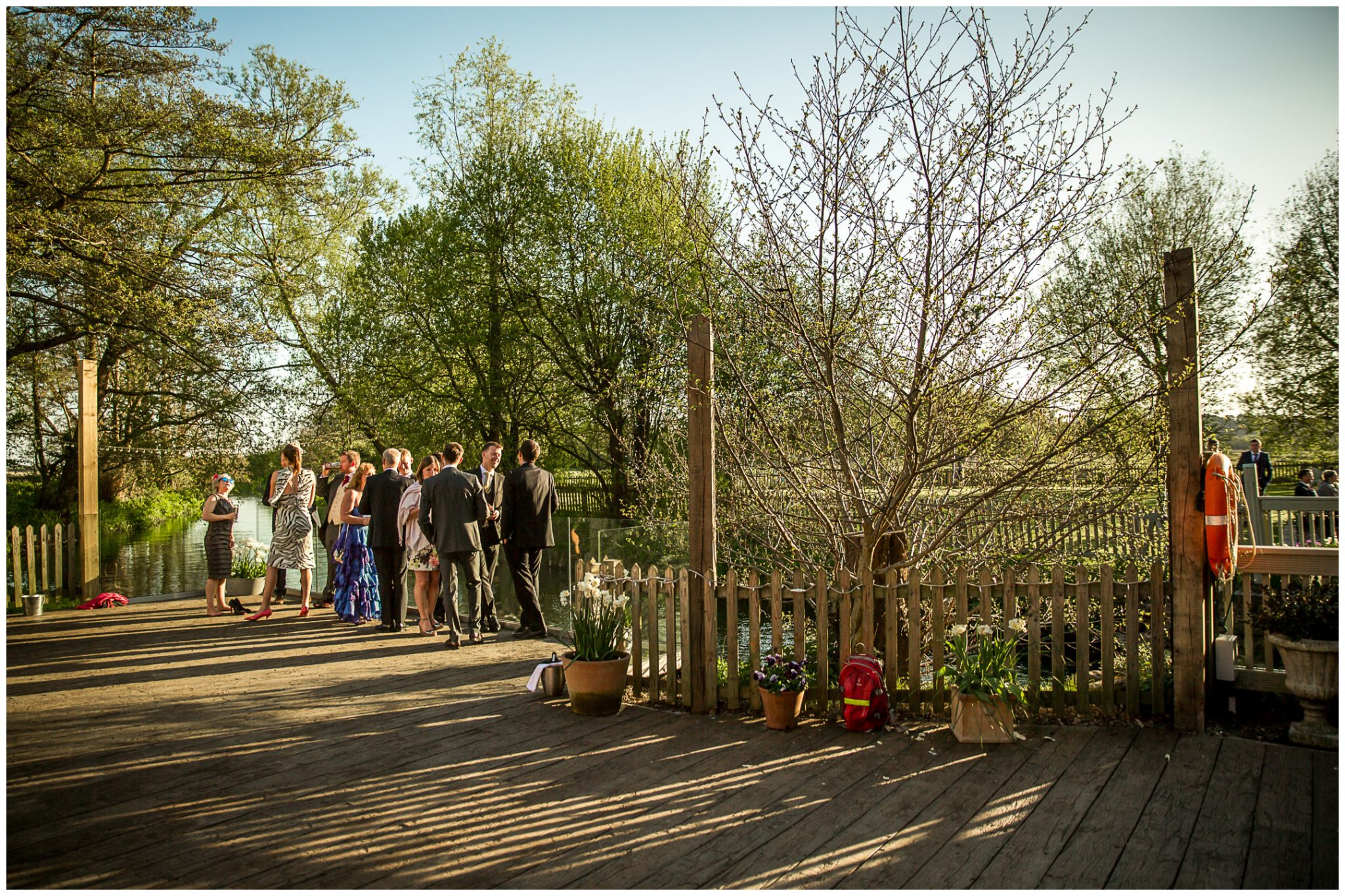 Sopley wedding photographer guests in evening sunshine