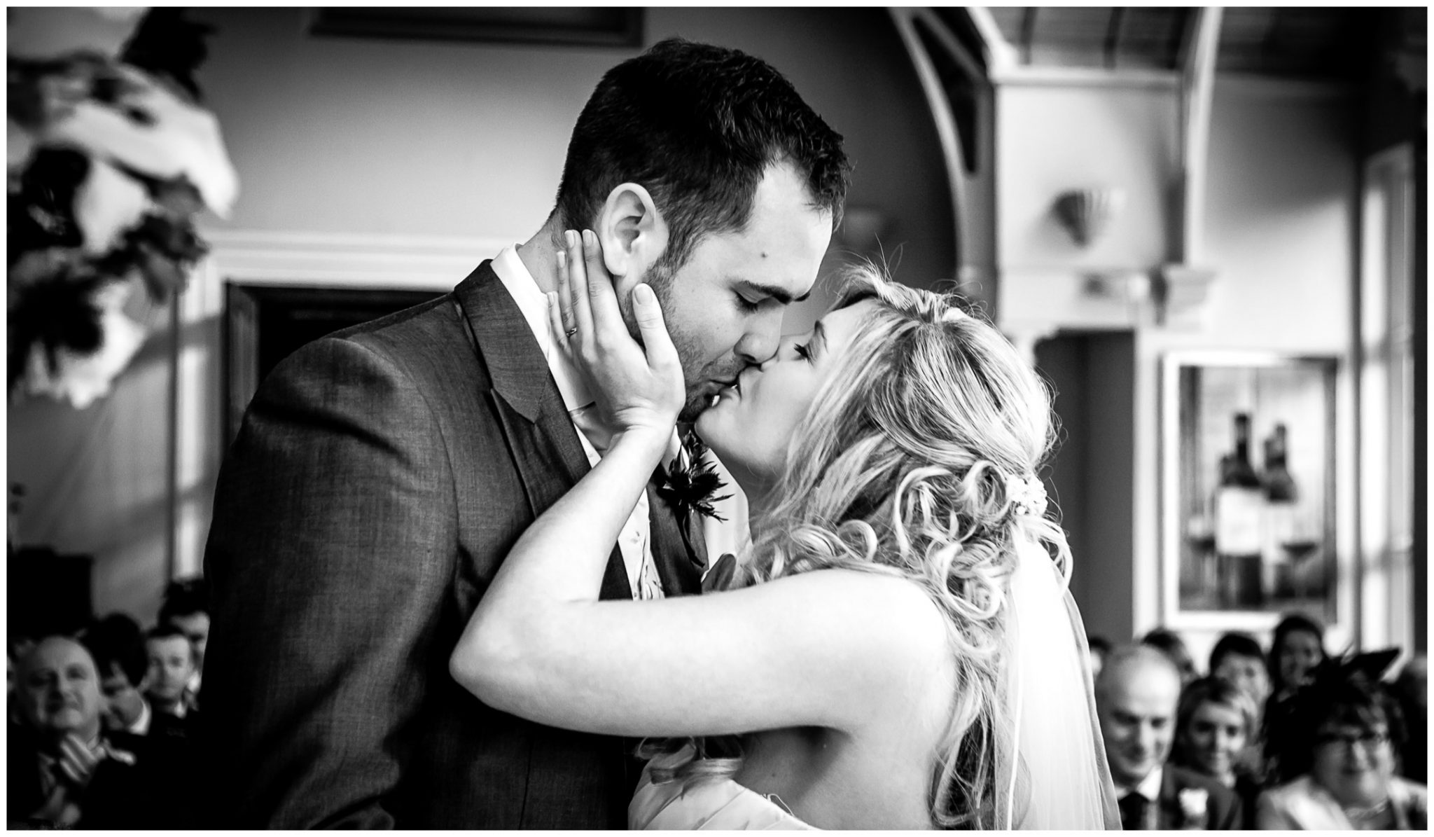 Audleys Wood wedding photography bride kisses groom to seal the marriage