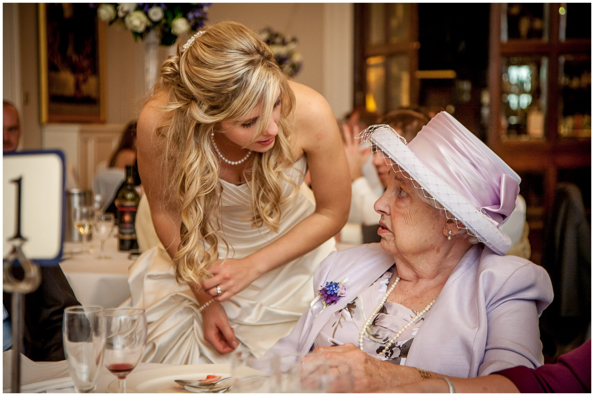 Audleys Wood wedding photography bride chatting to guest