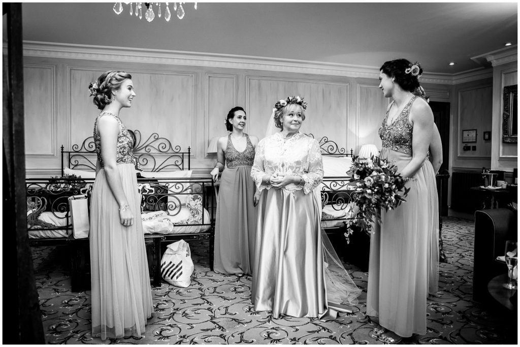 Bride with bridesmaids black and white