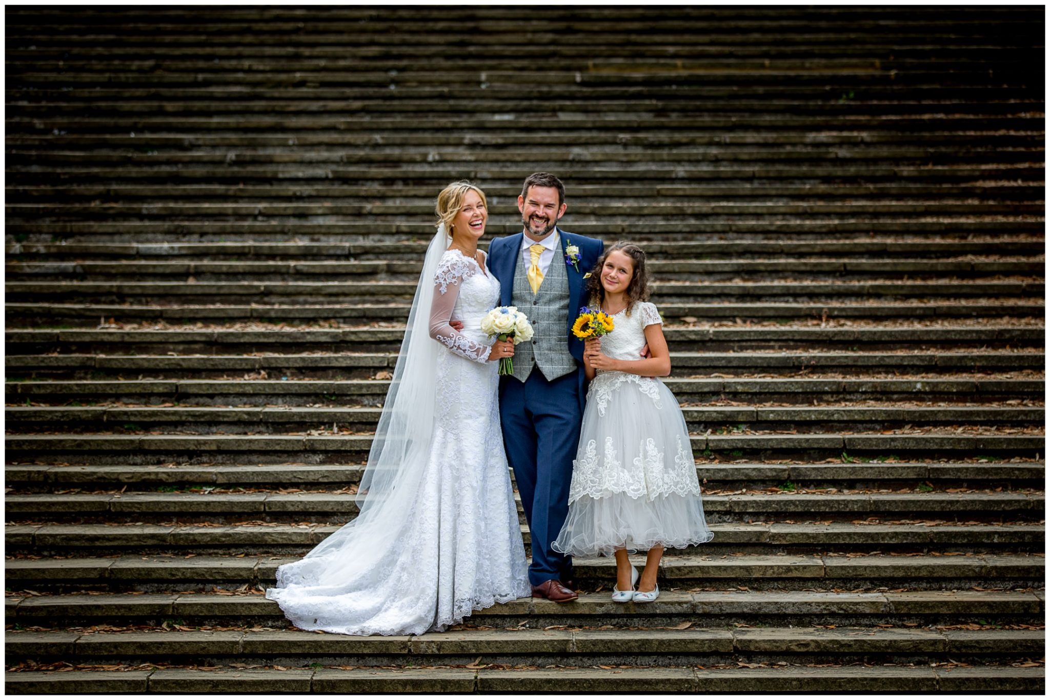 Family group wedding photo on Winchester law court steps