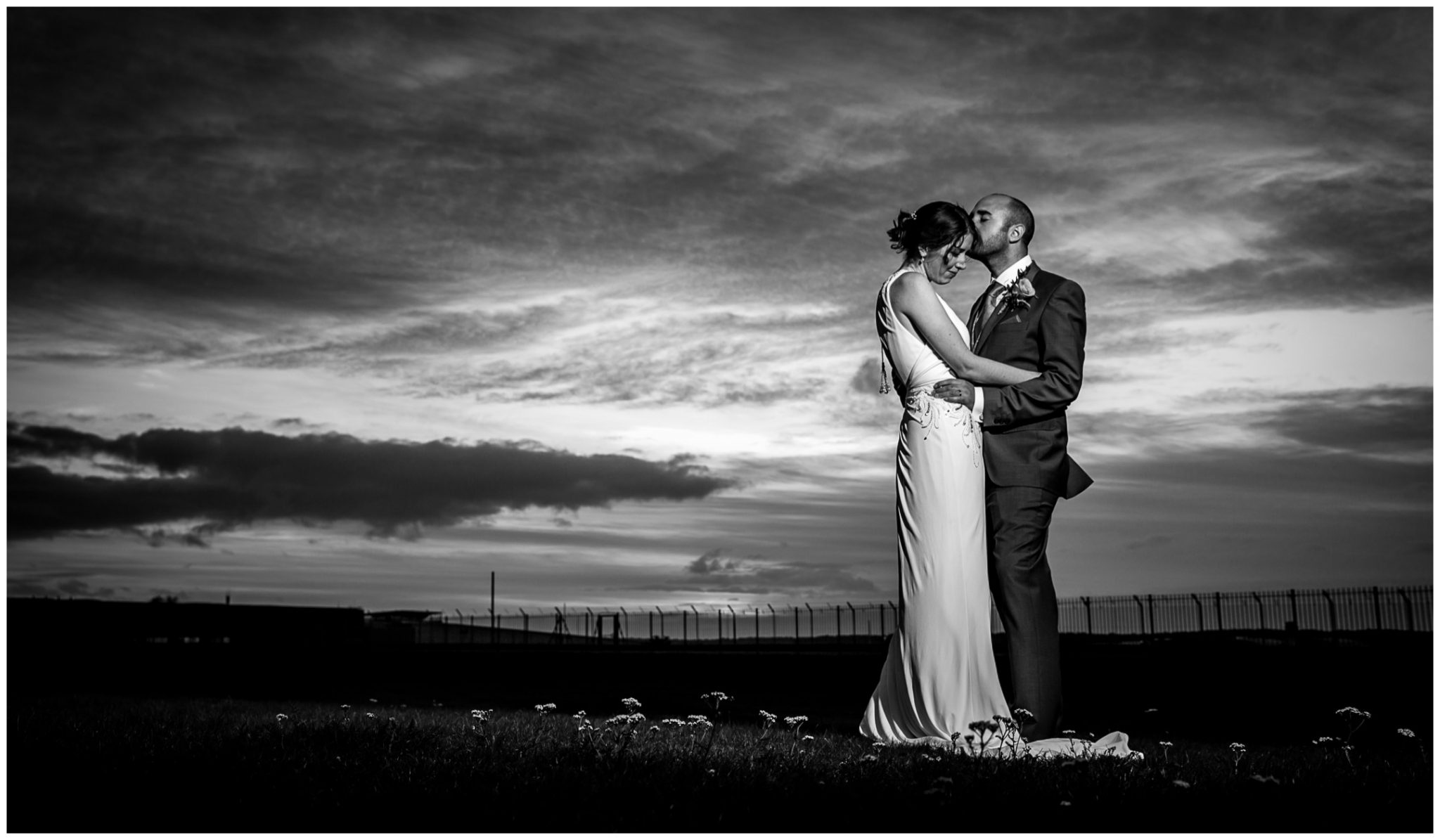 Black and white bride and groom flash lighting portrait