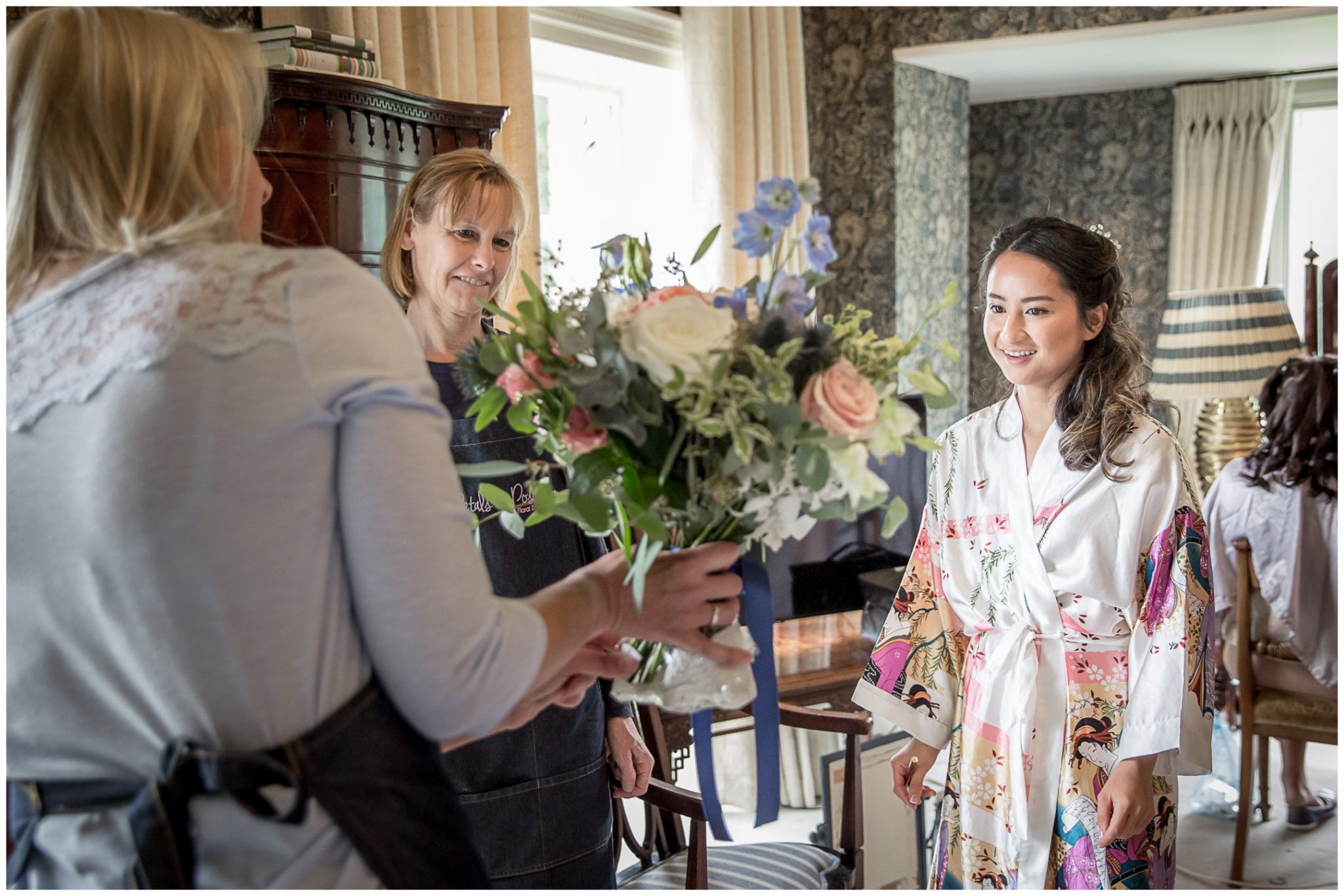 Bride receives her flowers in the bridal suite