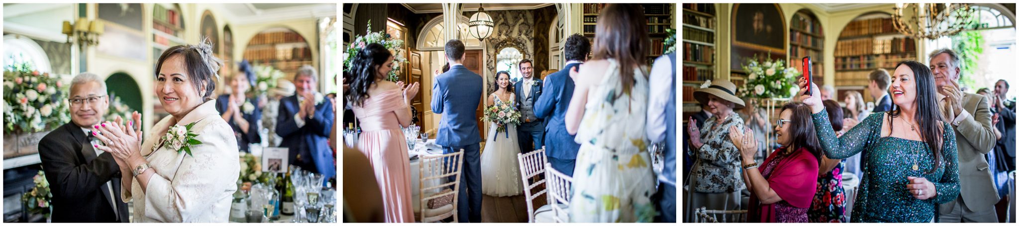 Friends and family clap as the couple enter the dining room for the wedding breakfast