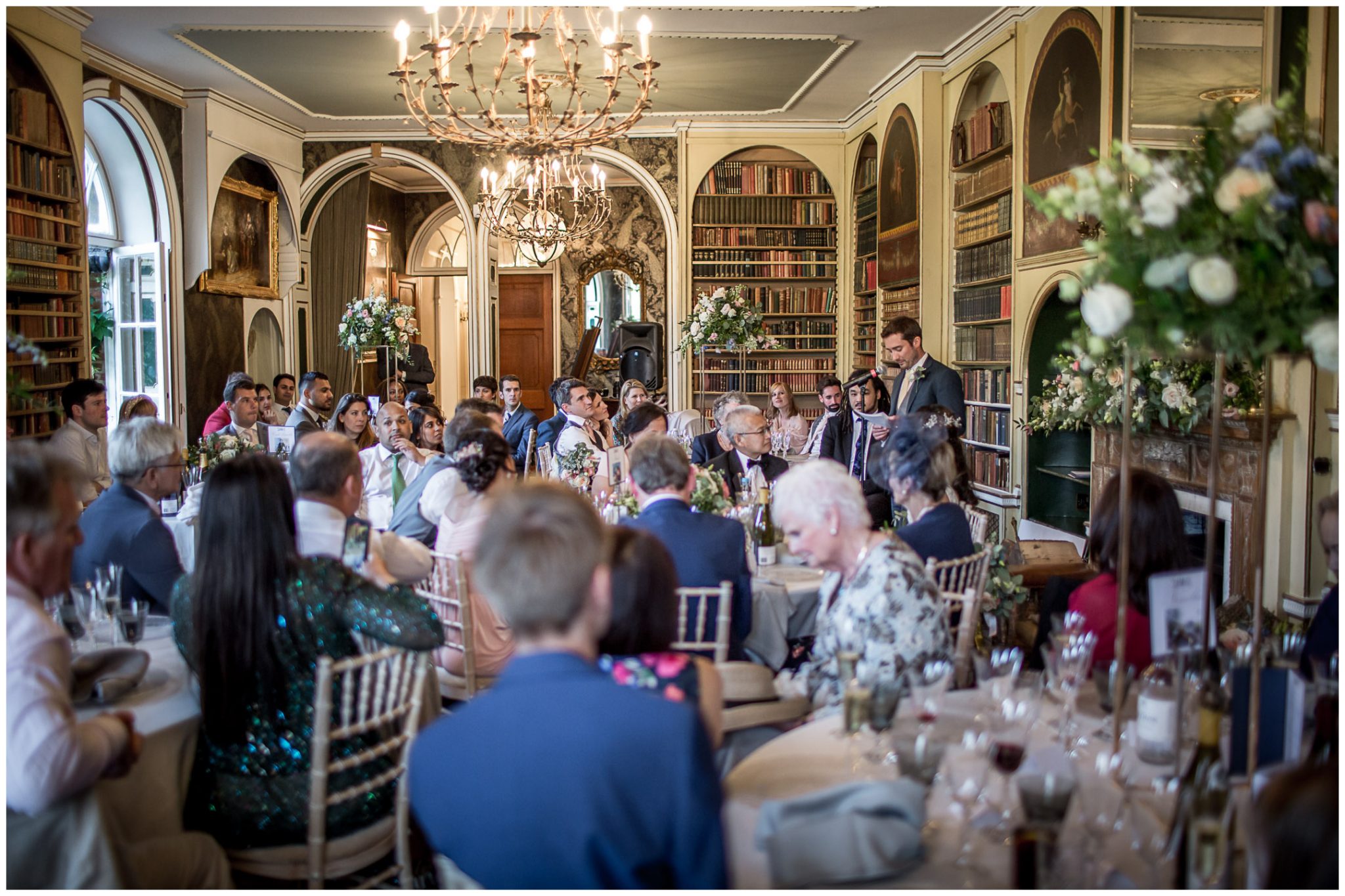The groom makes his wedding speech in the library of the Hampshire wedding venue
