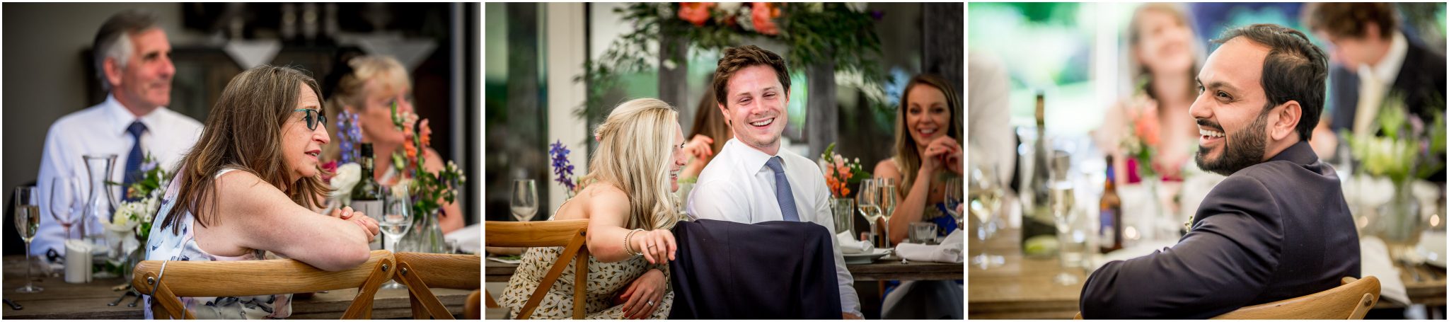 Wedding guests laughing during the speeches