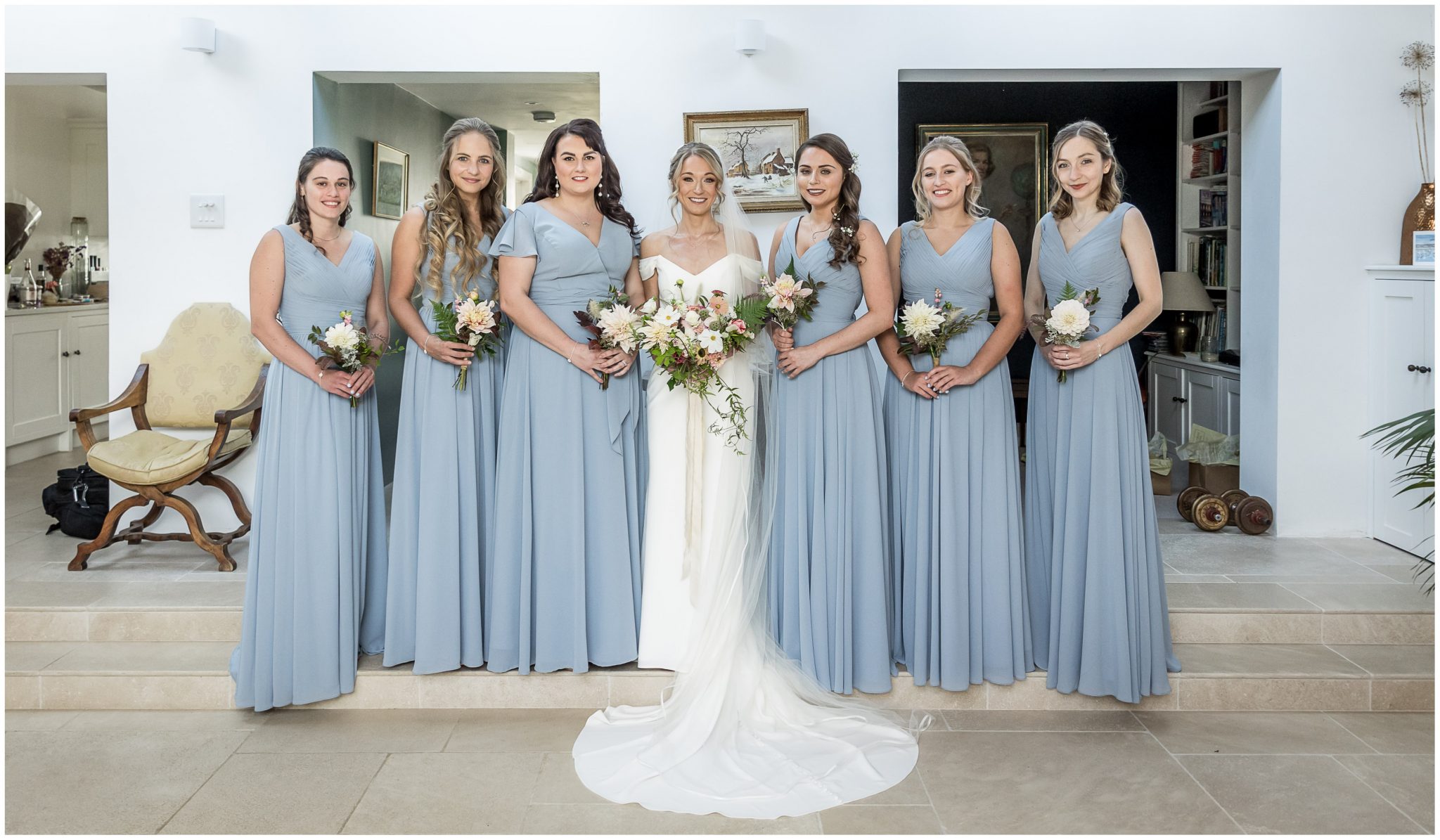Bride with bridesmaids before heading off to the ceremony