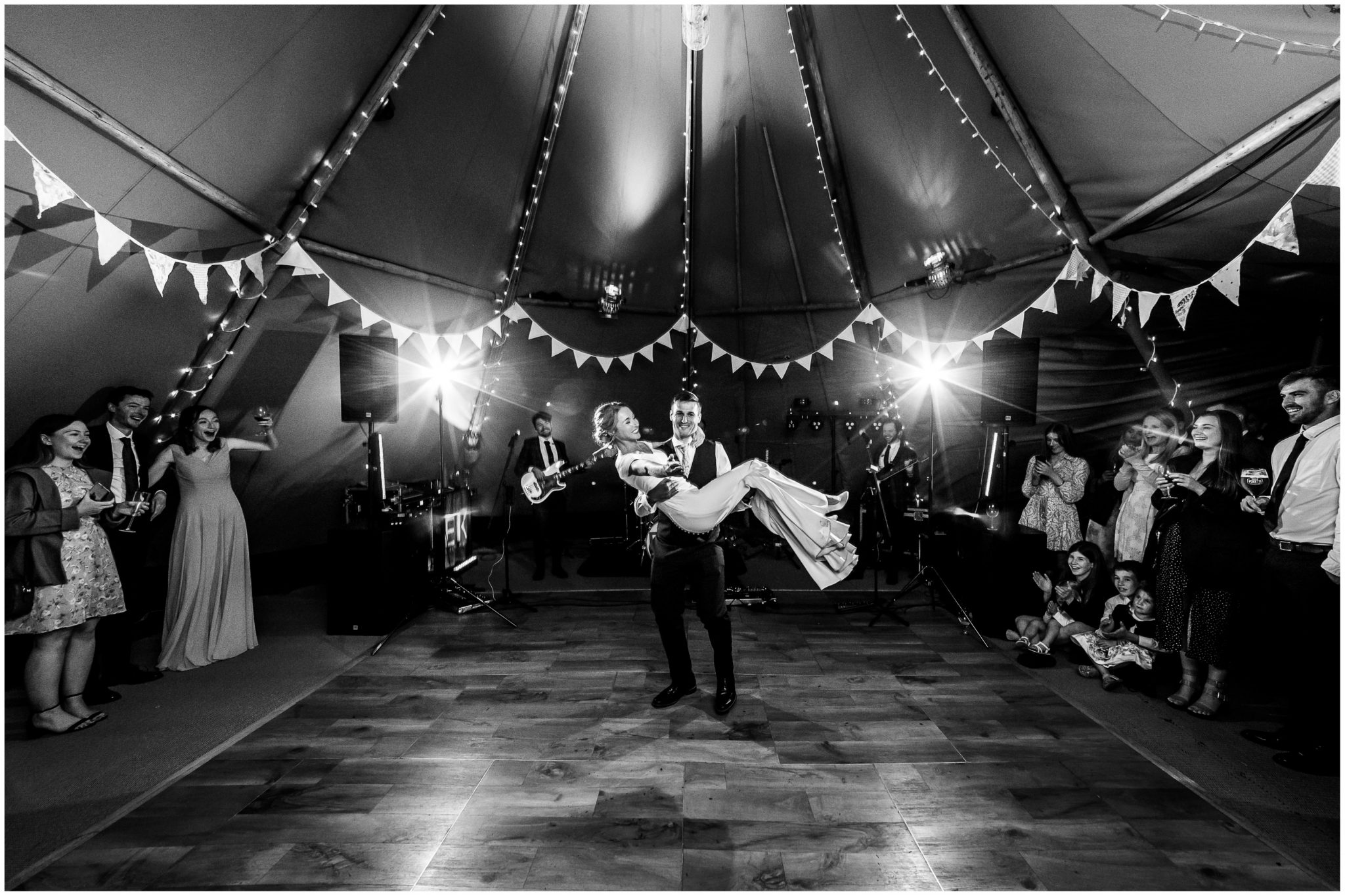 Black and white bride and groom first dance photograph