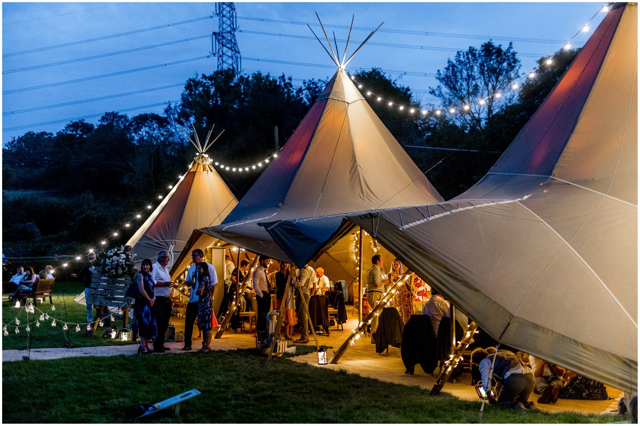 The tipi lit up and night for the evening party
