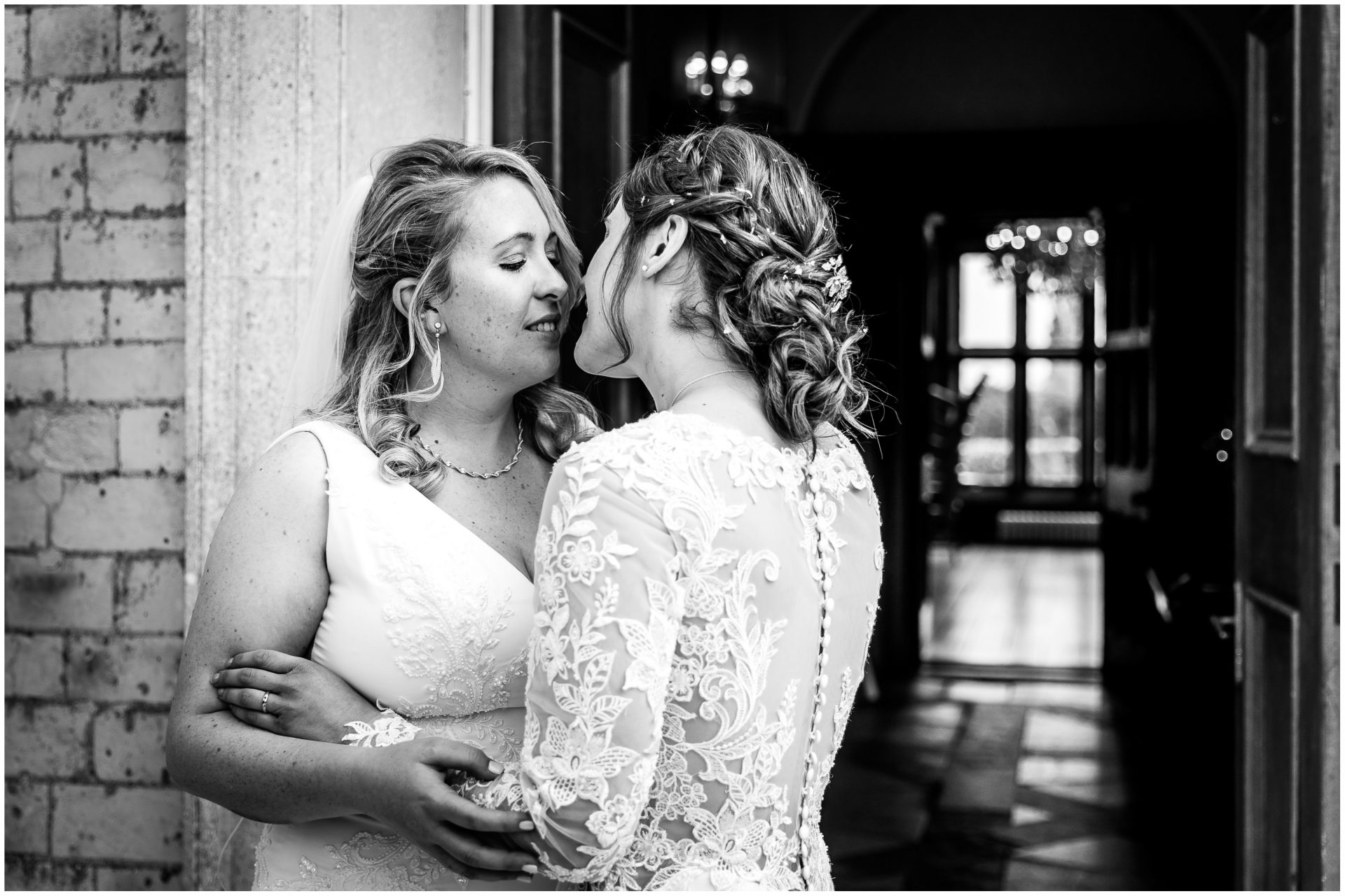 Same sex wedding in Hampshire kiss couple portrait