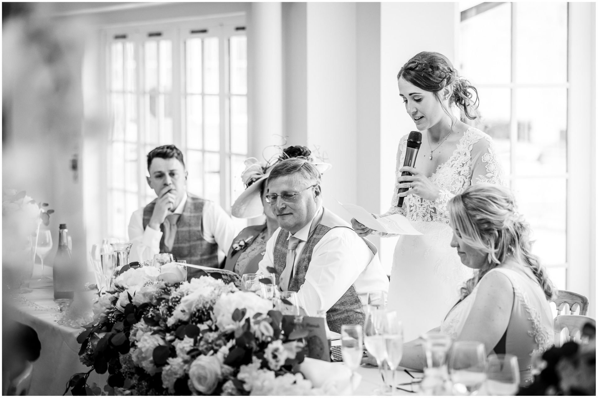 The bride stands to make a speech