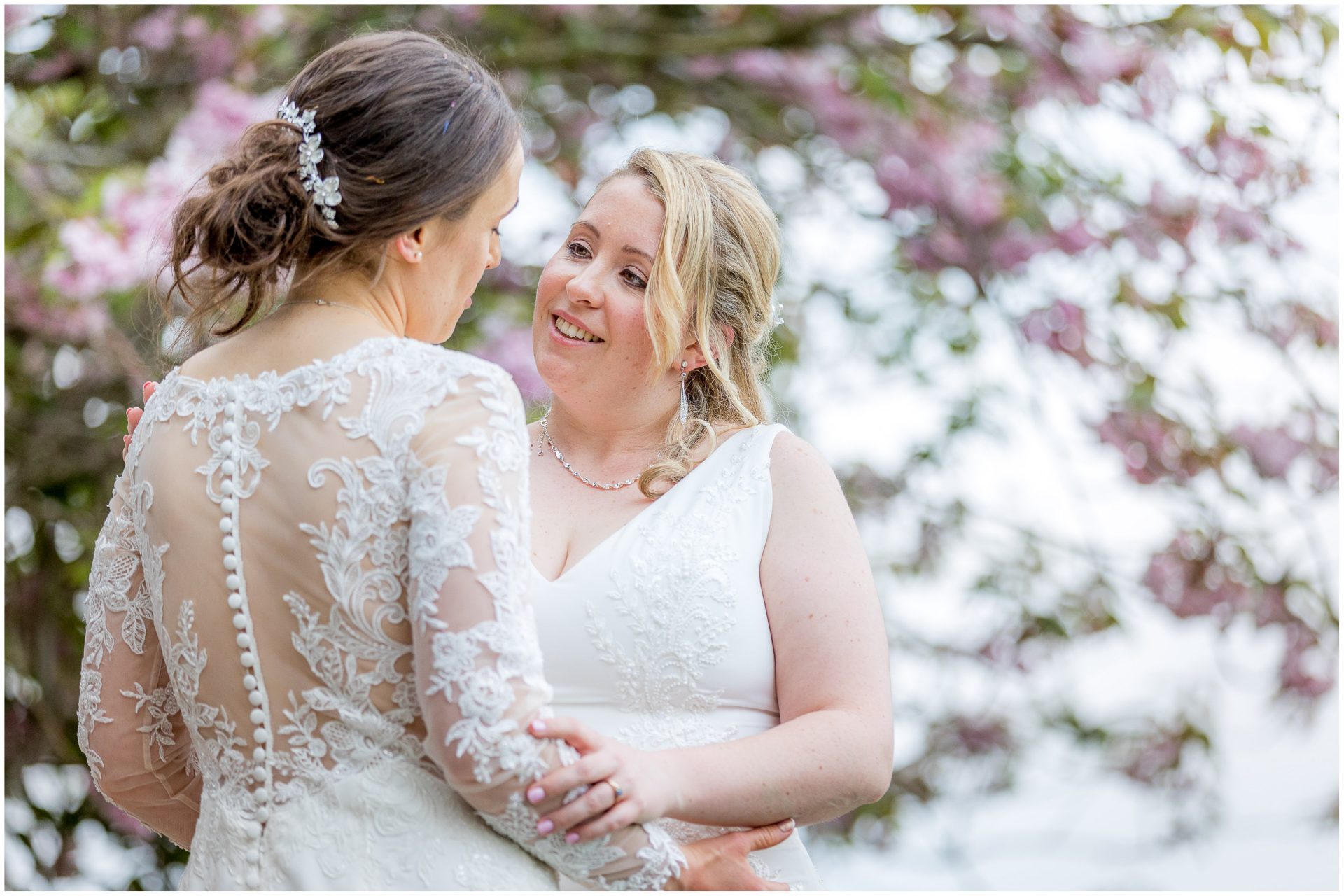 Two brides during couple portrait photo session in Hampshire