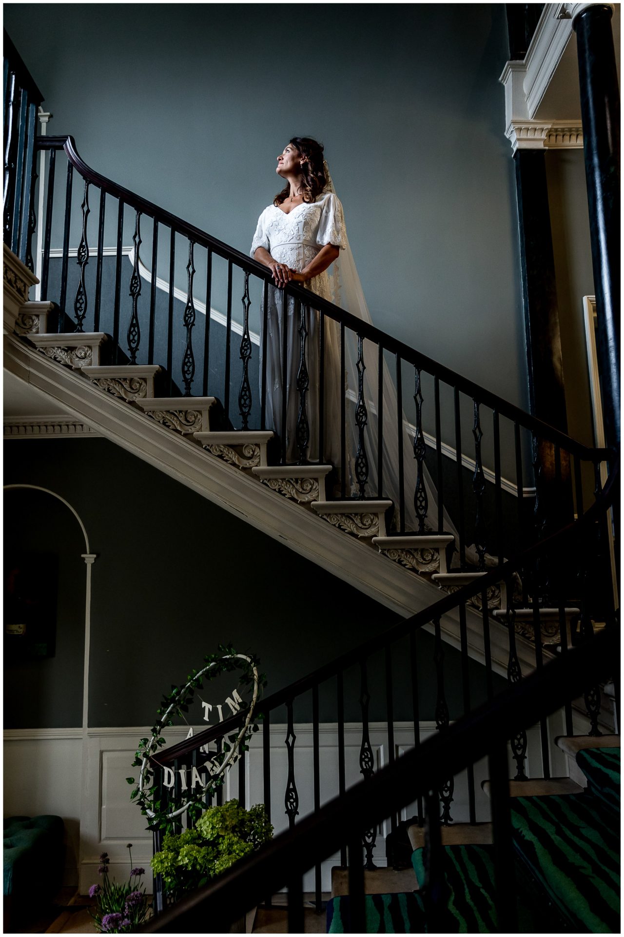 Bride portrait in natural light on the staircase at the Hotel du Vin in Poole